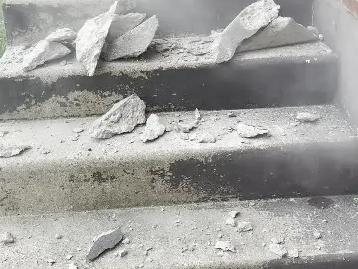 Old concrete steps broken out into rubble ready for removal and hauling in Cherry Hill, New Jersey