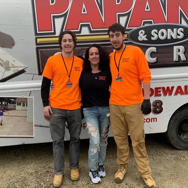 Papaneri & Sons team members standing in front of a branded concrete truck, the family crew serving Echelon, NJ