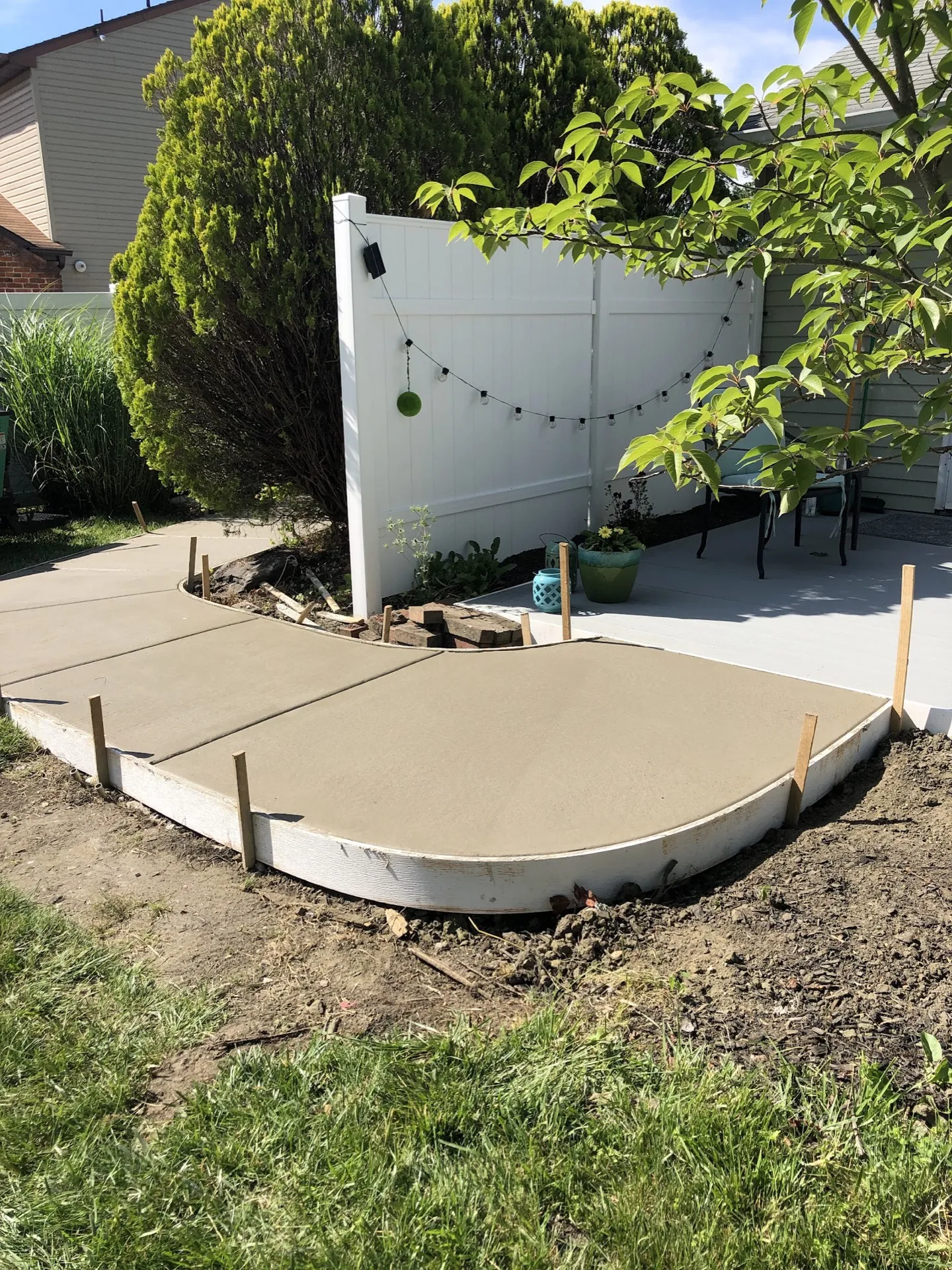 Curved concrete patio pad fresh pour still in forms Cherry Hill NJ