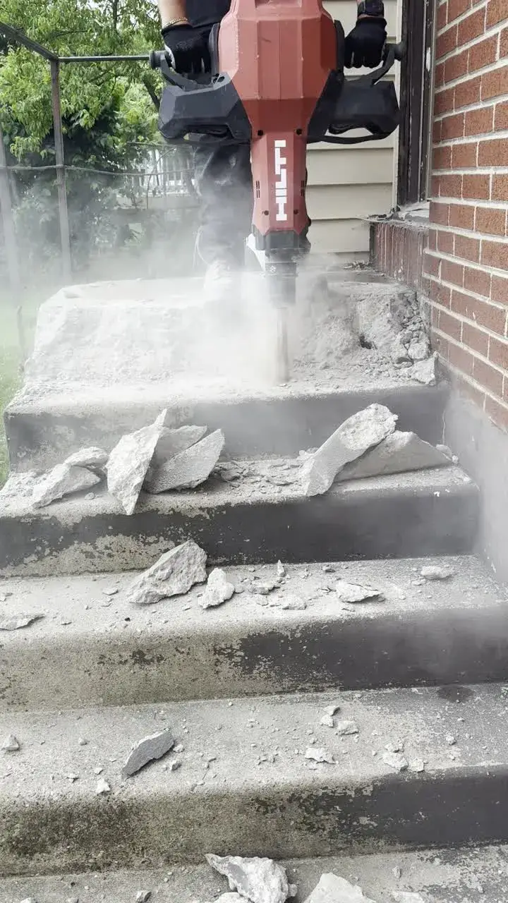 Breaking out failed concrete steps before a rebuild in Cherry Hill, NJ