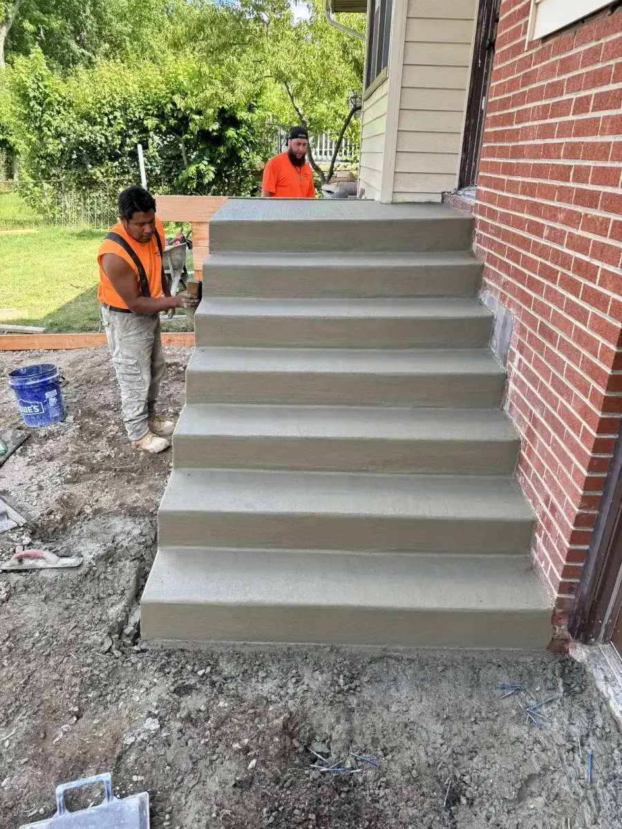 Papaneri crew hand finishing concrete step treads in Cherry Hill, NJ