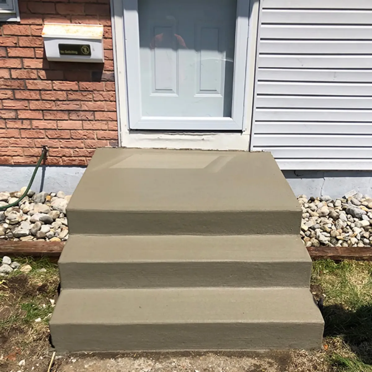 Rebuilt three-step concrete entry with a clean finish in Cherry Hill, NJ