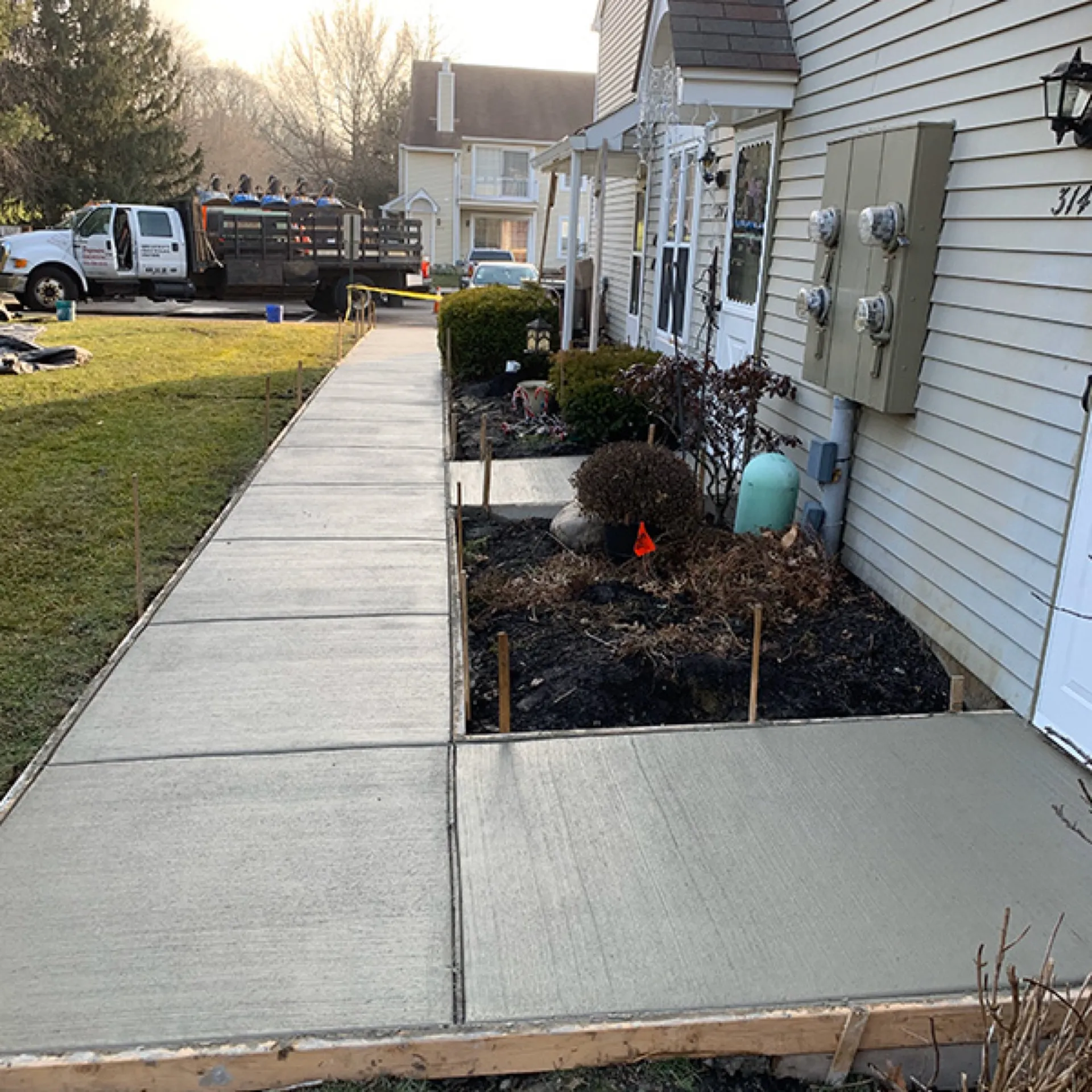New concrete walkway installed alongside residential home Cherry Hill NJ